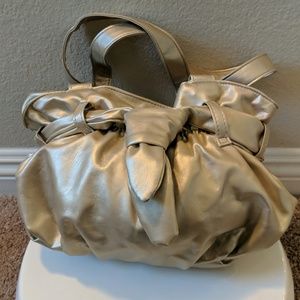 Metallic hand bag